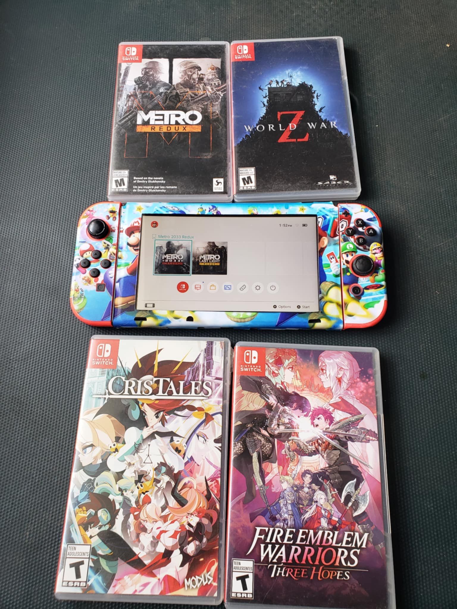 0 Games installed Unpatched Nintendo Switch V2 2020 With charger only $200! Games im keeping. You can't afford them or $30! Each. Or 4 for $100