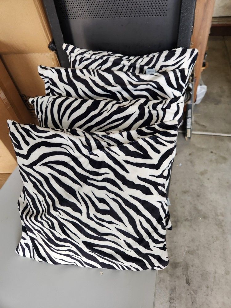 4 Double Sided Throw Pillows With 4 Zebra Print Removalble N Washable Covers. $40 All 4