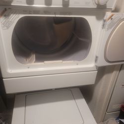 Whirlpool Washer and dryer stacked combo.