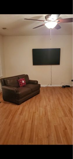 Brown love seat