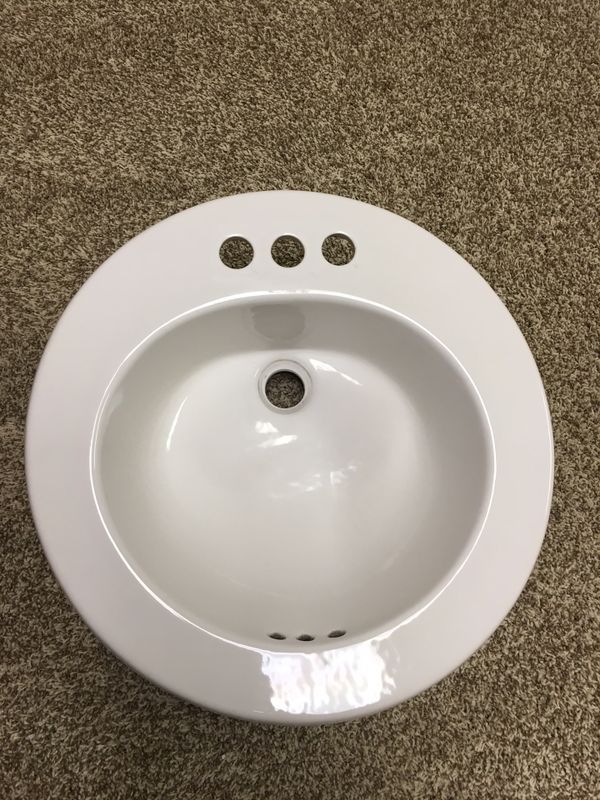 White drop in sink