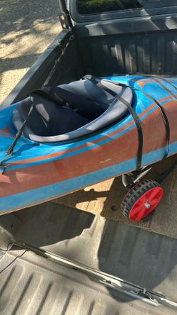 Kayak, paddle and trailer