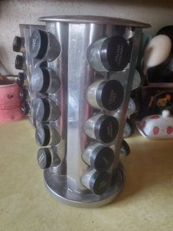 LAZY SUSAN SPICE RACK W/19 EMPTY SPICE BOTTLES(1 BOTTLE MISSING) 13" TALL x 8" WIDE