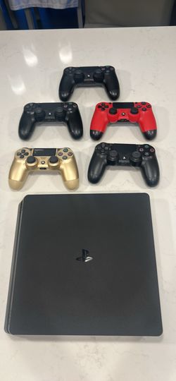 PS4 console and 5 controllers