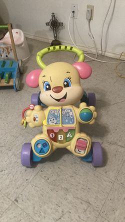 Fisher price trainer. Walk