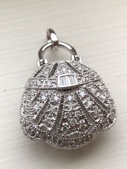 18k gold and diamond purse pendant