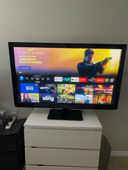 50” Panasonic Flat Screen TV + Amazon Fire Stick + Stand