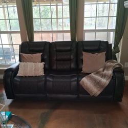 Two Brown Leather Reclining Couches Plus Coffee Table 