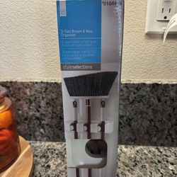 Broom and Mop Organizer
