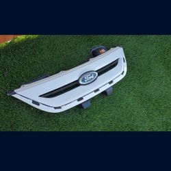 2011-2013 FORD FIESTA GRILLE GRILL
GENUINE USED OEM. Nc2
