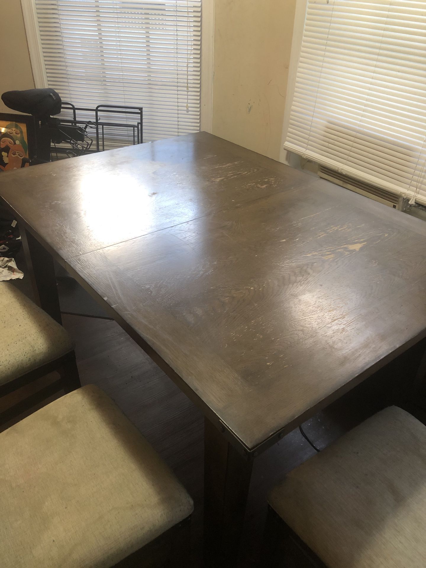 Dining table with unused leaf, bench, and 4 chairs