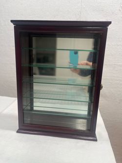 Cherrywood wall mounted display case with glass shelves
