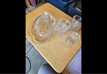 Tea set with plates and cups.