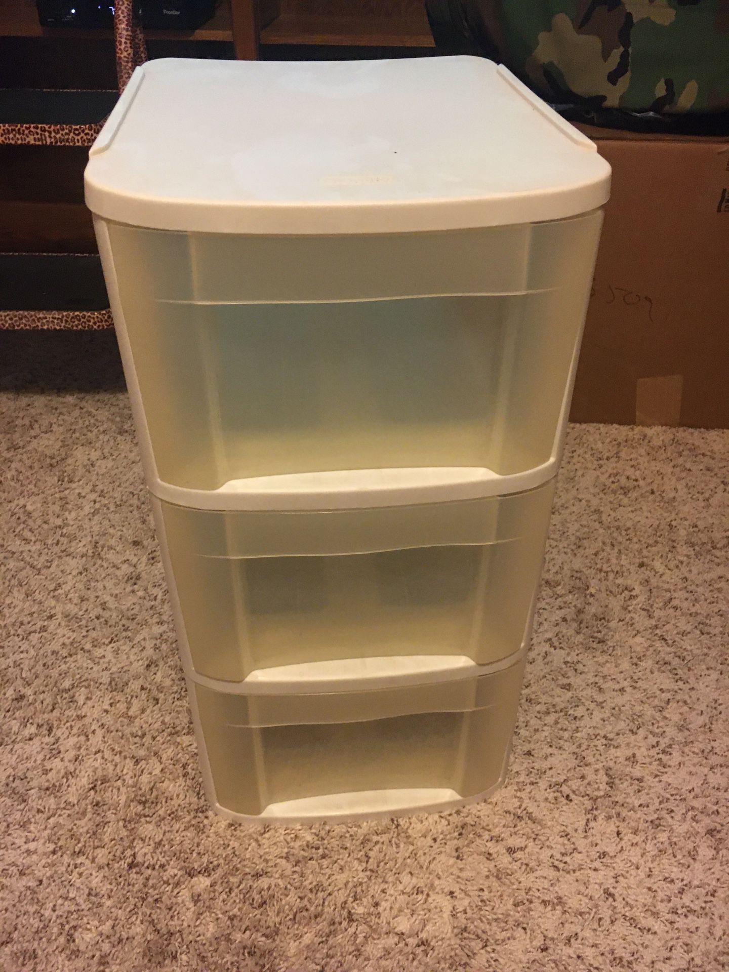 3 plastic storage drawers with rollers