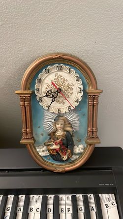 St Therese  of lisieux clock antique