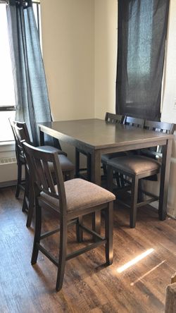 Long dining table with 7 chairs
