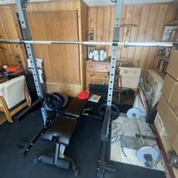 Power rack + Barbell + Set Of Weights 