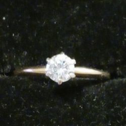 The 14 K  Gold Diamond Ring 1.6 Grams