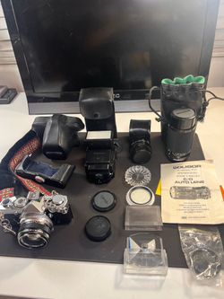 Olympus OM-1 MD 35mm Film Camera w/ 50mm f/1.8 Zuiko lens and accessories