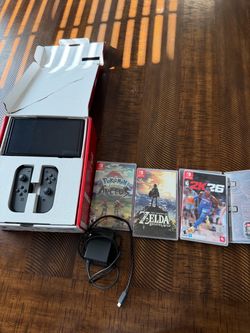 Nintendo switch OLED bundle w pokemon make an offer has to go