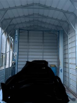 BEND PAK 2 POST AUTO LIFT WITH OUTDOOR METAL COVER