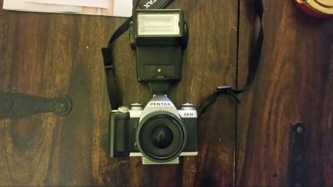 Pentax zx-m camera with flash