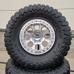 17" KMC KM237 Beadlocks w/ 35x12.50R17 Toyo Open Country MT tires