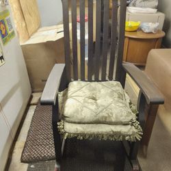 Antique Rocking Chair with cushion
Dark Wood 
No squeaks 
Very sturdy 