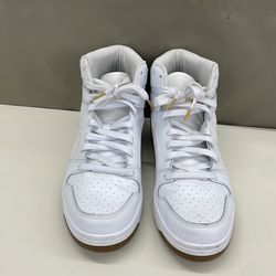 White and  Gold Pumas. Item No 260 (Shopgoodwill )