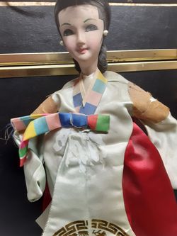 Oriental doll figurine