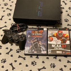 PlayStation PS2 With 2 Games And Controller.