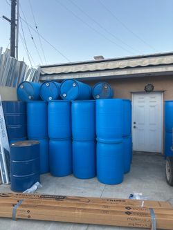 55 GALLON BLUE PLASTIC DRUMS