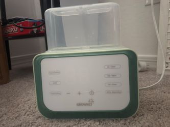 Growsy milk bottle warmer