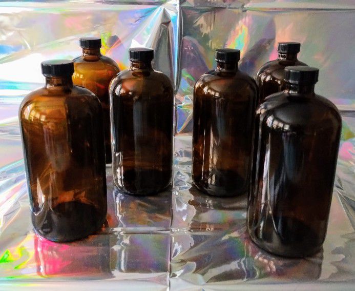 Box Of Six 32oz. Amber Boston Round Glass Bottles With Black Poly Cap