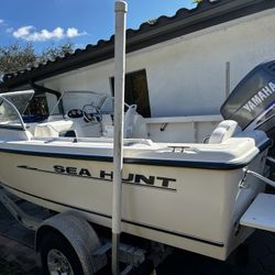 2003 20FT SEA HUNT ESCAPE DC 2003 150 YAMAHA ALUMINUM TRAILER