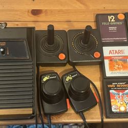 Atari with all hook ups and 10  games