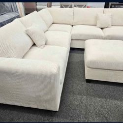 β
οΈβ
οΈ4 pc ivory cordury fabric upholstered sectional sofa with ottoman.