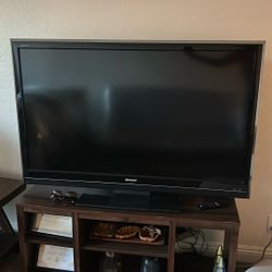 Sharp 60 inches, all working. With dvd player