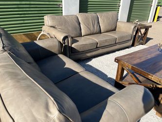 Leather Rare genuine Leather couch and love seat in off brown color