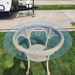 Glass and wicker table.