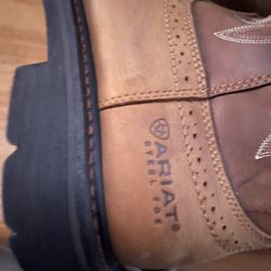 This is a pair of Ariat Men's Sierra Wide Square Toe Steel Toe Work Boots in aged bark brown leather. Size 11