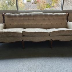 Pair Of Couches With Carved Wooden Frames