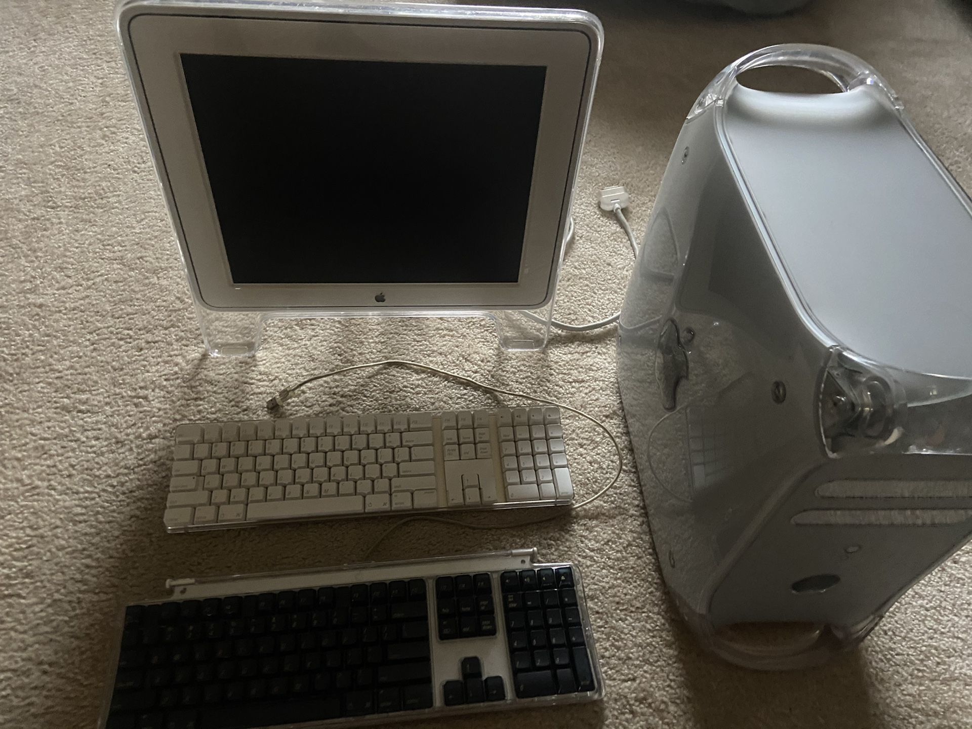 Apple computer with G4 tower and wireless keyboard