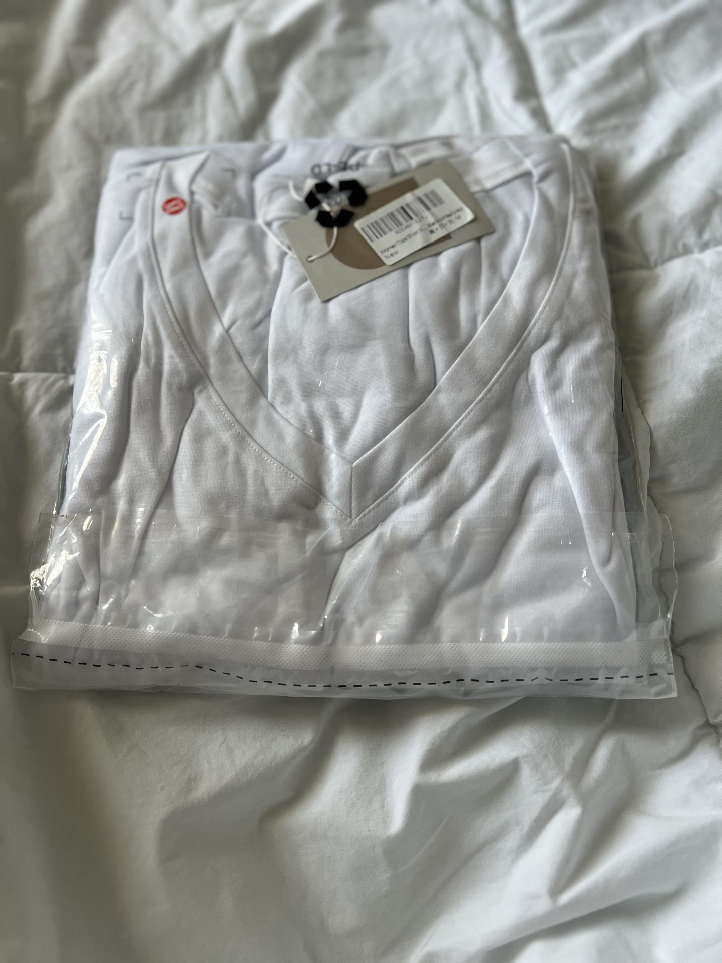 Brand new with tags. Set of 3 soft v-neck tees