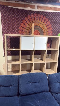 Ikea cubby shelf with white leg stands
