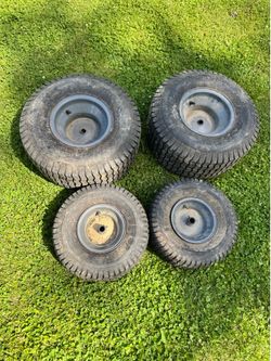CARLISLE TRACTOR RIM & TIRES $50