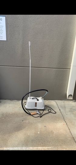 A steamer to clean clothing and couches and wall