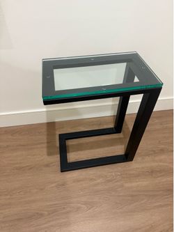 Crate & Barrel clear glass side table