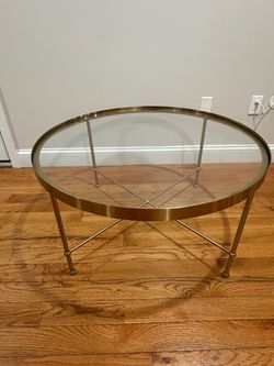 Gold coffee table with tray and vase