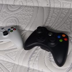2 Xbox Game Controllers